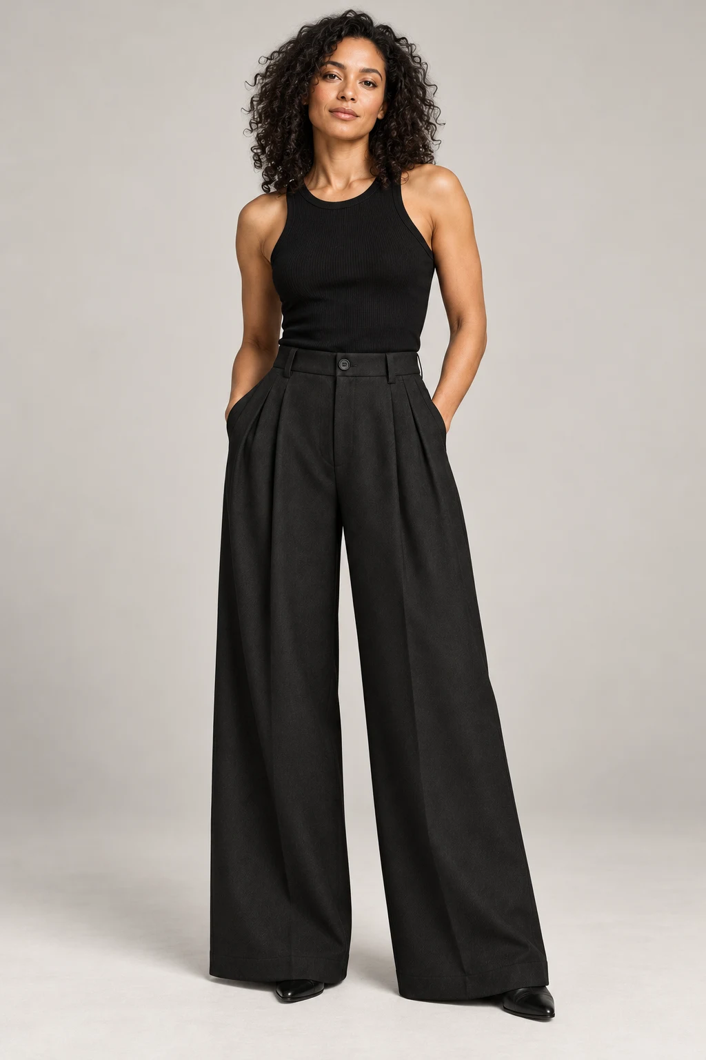 Pleated Wide-Leg Trouser in Ink black — On model
