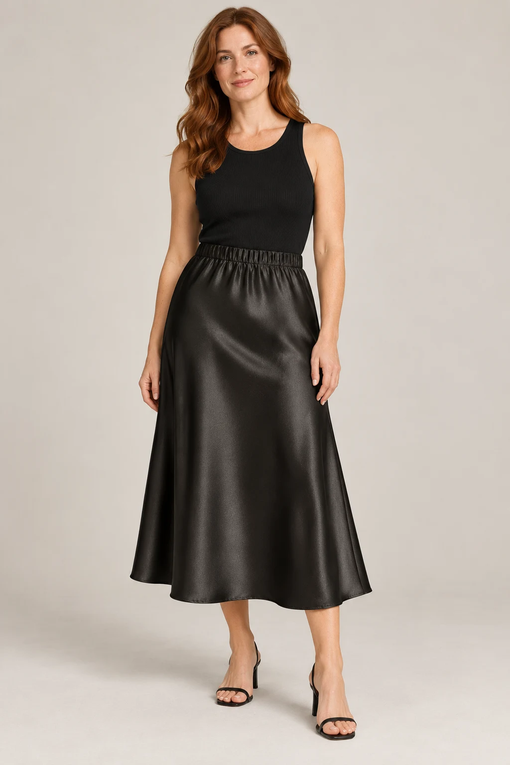 Liquid Satin Midi Skirt in Ink black — On model